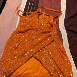 Orange glittery dress